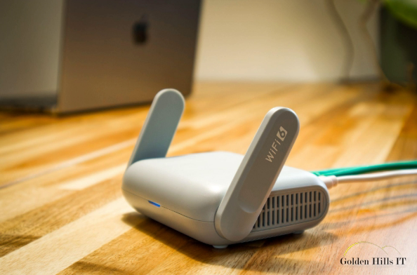 Wi-Fi router with antennas on a wooden desk
